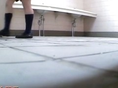 Frisky schoolgirl sits on hunkers and masturbates up skirt