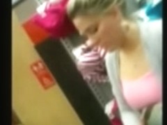 Perfect blonde in fitting room with face