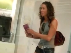 Hot brunette in a street candid video