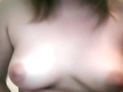 Chubby blonde girl plays with her big tits and shaved pussy on her bed