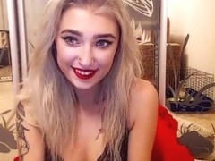Blonde WebcamSlut shows her tattoos