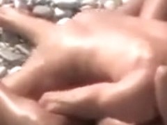 Naked couple fuck on a beach,