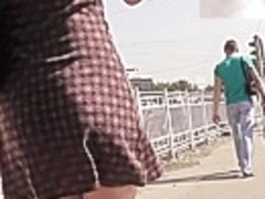 Upskirt straps filmed outdoors