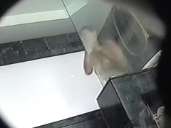 Full bodied female voyeured showering on the spy cam