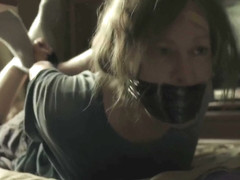 Mature Woman Hog Taped And Tape Gagged