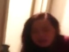 Asian girl watches herself getting doggystyle fucked in the mirror