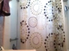 Teenage brunette on the toilet and in the shower