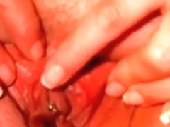 Pierced vagina of lustful chick gets finger screwed on camera