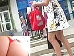 Booty and slit in red string