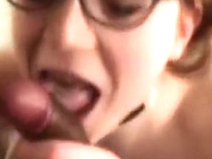 Redhead With Eyeglasses Blows a Black Dick
