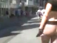 hot girl leaves parade and flashes on city streets