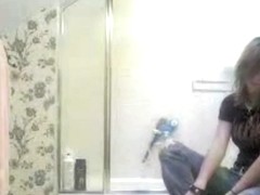 Punk girl getting ready for shower sees hidden cam