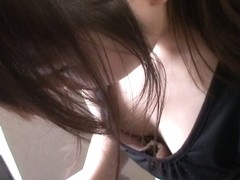 Friendly Asian downblouse on flat chest while she writes and giggles