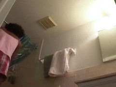 Sexy black girl caught nude in her own bathroom by a spy cam