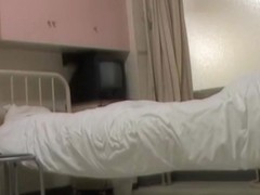 Japanese nurse was making a bed when man sharked her bottom