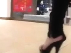 teen heel flashing in mall