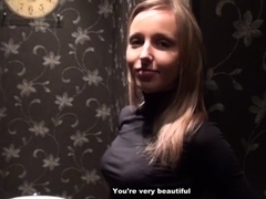 Slender golden-haired shows striptease in the lavatory