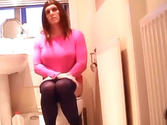 Sissy Smoking While Taking A Pee
