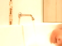 Brunette Beauty Taking A Shower