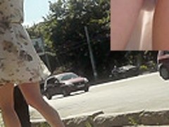 Voyeur upskirt video with short-haired brunette