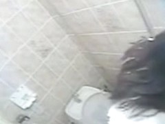 Gal sets comfy on toilet and gets hidden masturbation orgasm