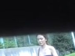 Sexy Asian with a thong got her skirt sharked while walking