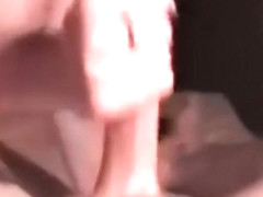 Busty milf plays with a cock