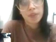 babe with glasses plays with pussy at work on camboozle.com
