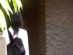 Sharking of a sexy Japanese chick in a white shirt