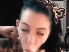 Tattooed smiling chick gives a head ends with a facial