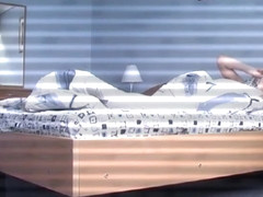 Uninhibited blonde takes her clothes off and goes to bed in