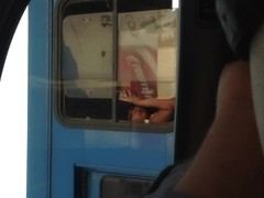 Another angle to girl in bus