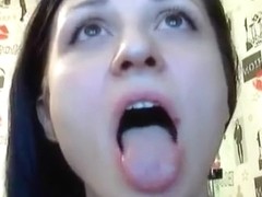 Illana licking a rubber penis
