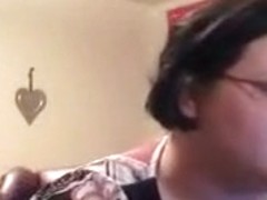 Fat glassed nerdy emo girl uses a vibrator to satisfy her pussy, while smoking a cig