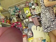 Babe filmed by spy upskirt camera in the local store