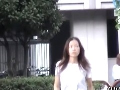 Curious long-haired Asian babe getting tricked during quick sharking action