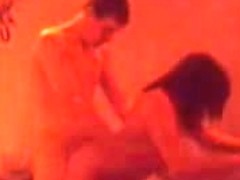 Doggystyle sex in the dim red light makes this vid so sexy