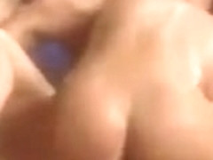 An erotically filmed gangbang with a blonde