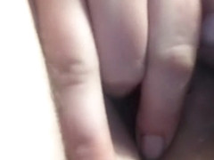 Fluffy Amateur rubs her Fuzzy Pussy.