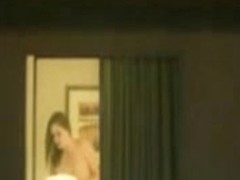 Neighbor spied topless in her bedroom