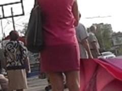 Golden-Haired in pink costume very sexy upskirt