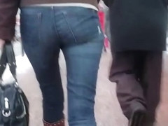 Ass in blue jeans go to the office