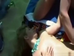 Girl has a threesome with 2 guys on a nude beach