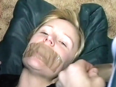 Blonde Bound And Tape Gagged On The Floo