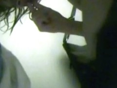 Girl is fucking in dressing room on the voyeur camera