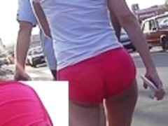 Pink mini shorts on the large butt