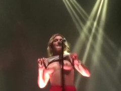 Swedish blonde flashes her tits on stage! #Tove Lo
