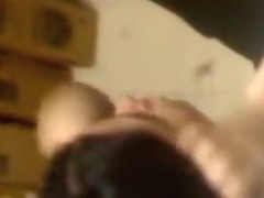 Voyeur tapes a latina employee sucking her bf on the job