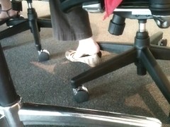 Shoe teasing below the desks...