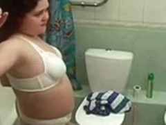 My chubby girlfriend in bathroom spied with hidden cam